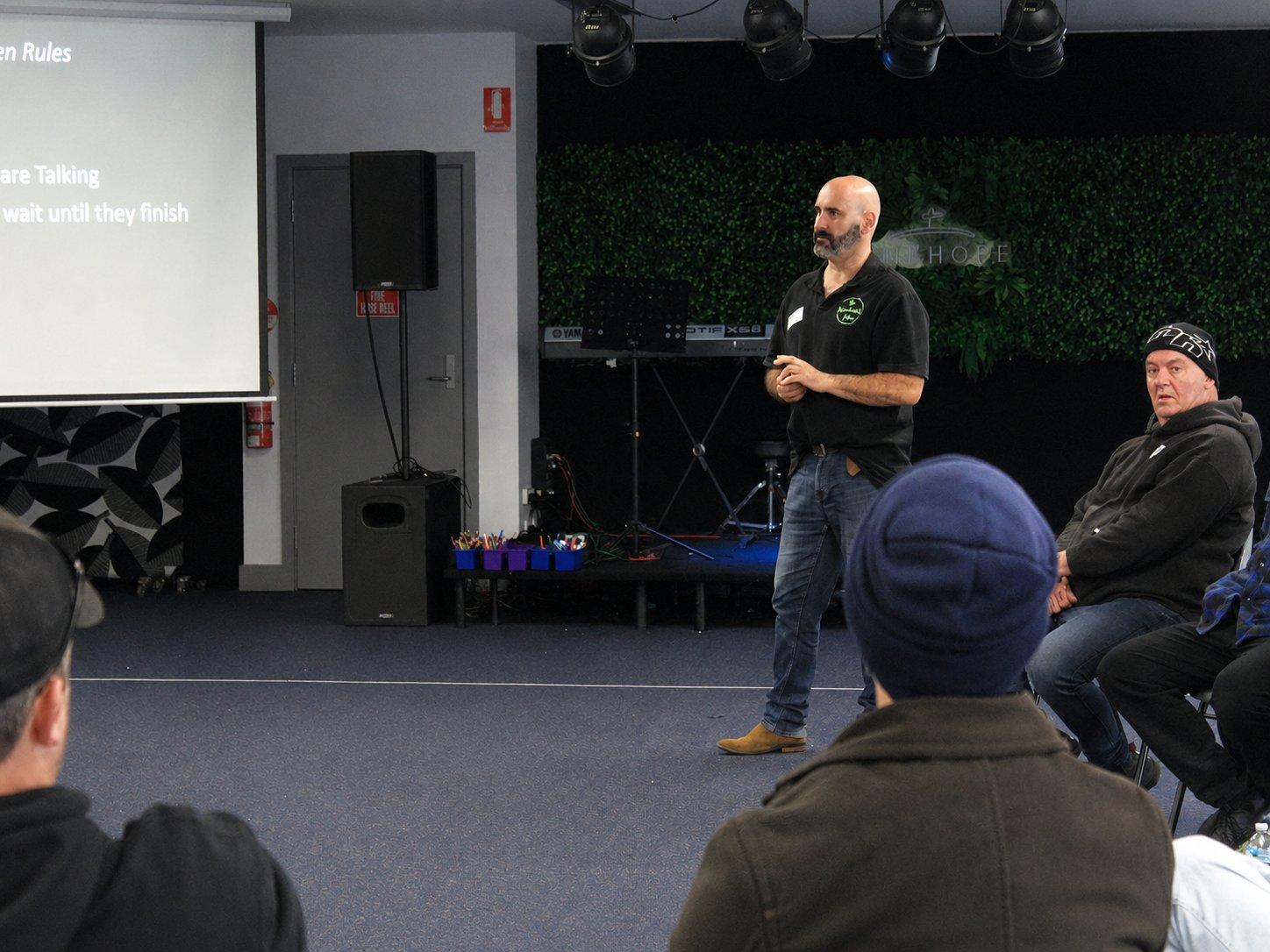 A Wandering Man session in progress - a member speaking to the group