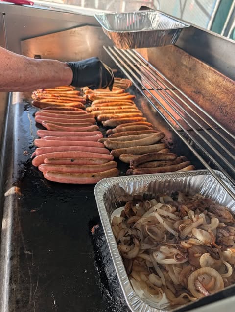 Grovedale Meats snags on the grill at a Wandering Man BBQ
